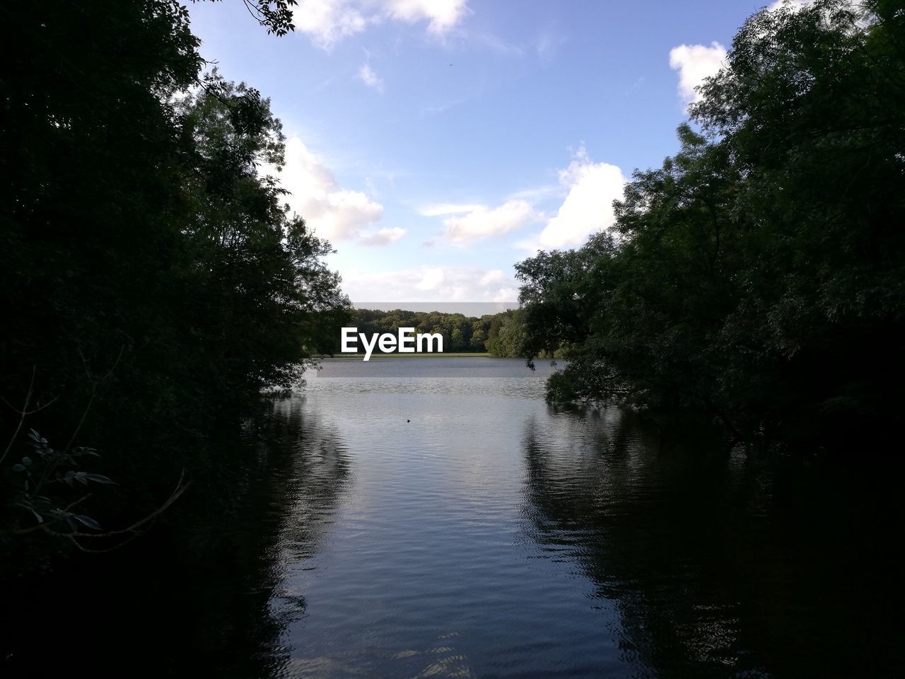 Scenic view of river against sky