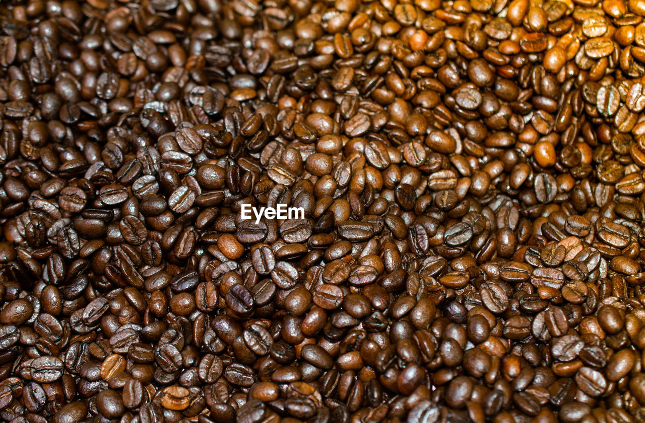 Coffee beans ready for the grinder background