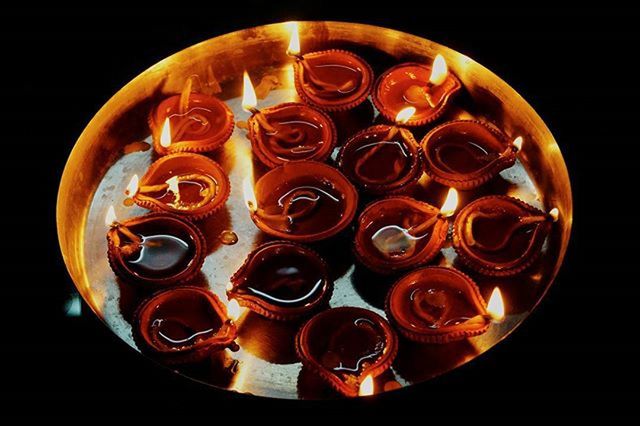 CLOSE-UP OF FOOD ON BLACK BACKGROUND