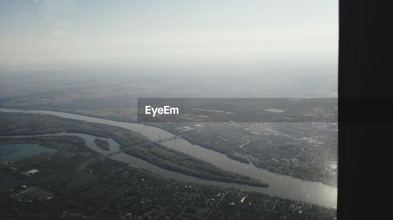 AERIAL VIEW OF LANDSCAPE AND MOUNTAINS