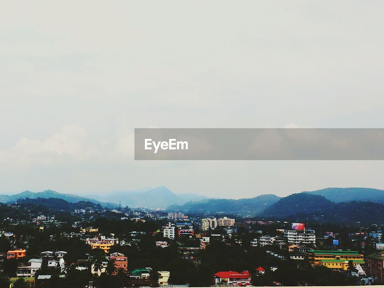 Cityscape with mountains in background