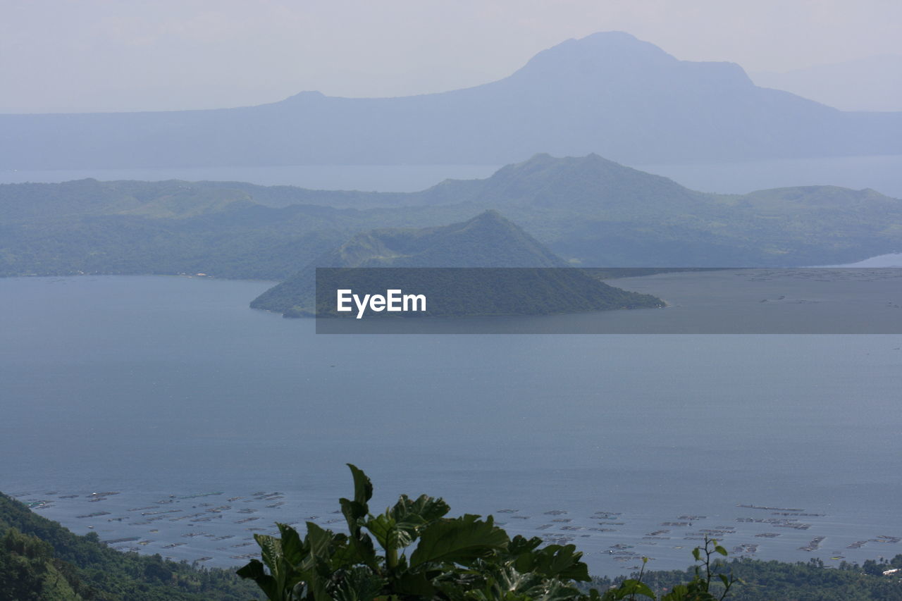 VIEW OF LAKE AGAINST MOUNTAIN