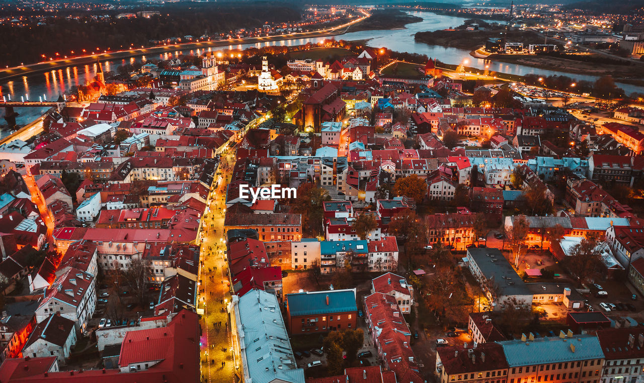High angle view of illuminated buildings in city