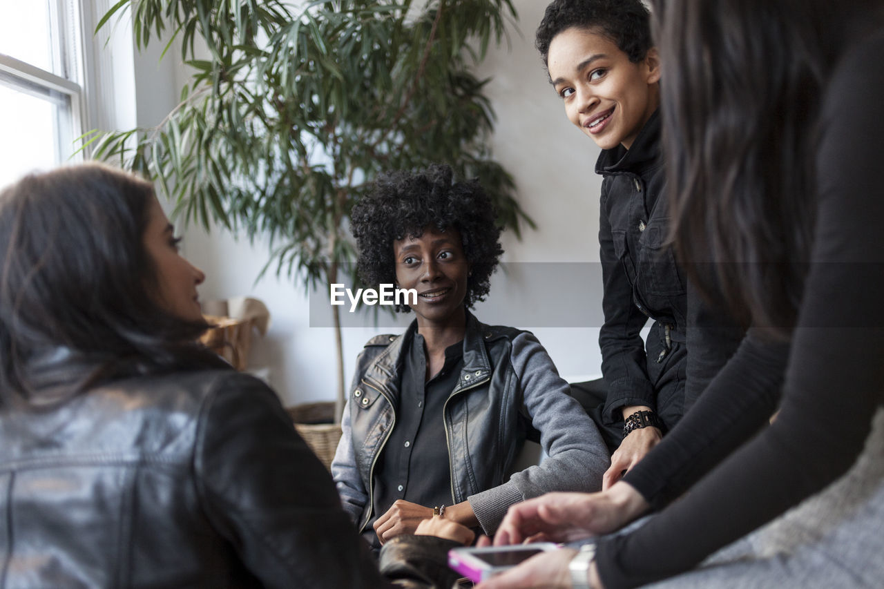 Young professional women working in an office space