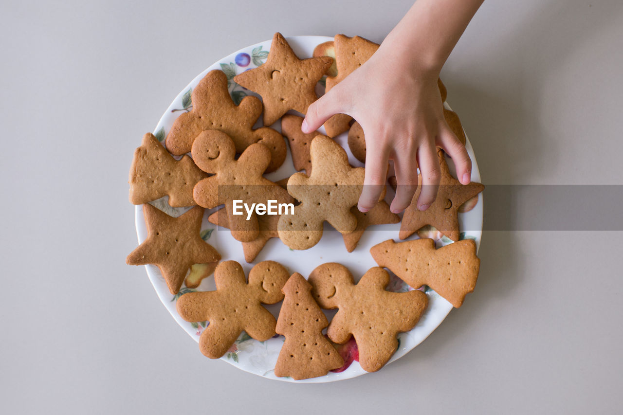 Close-up of hand holding cookies