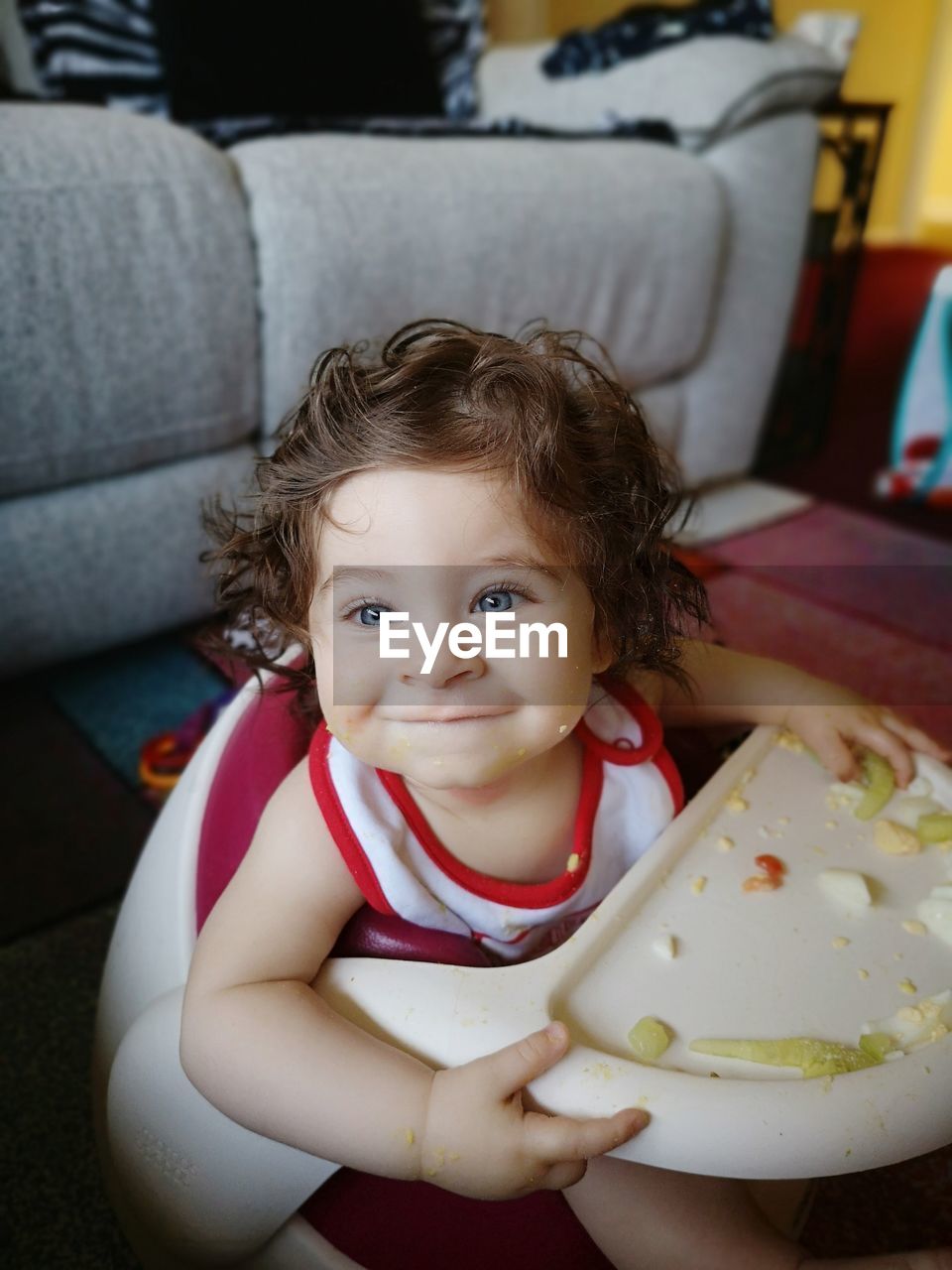 Smiling baby boy at home