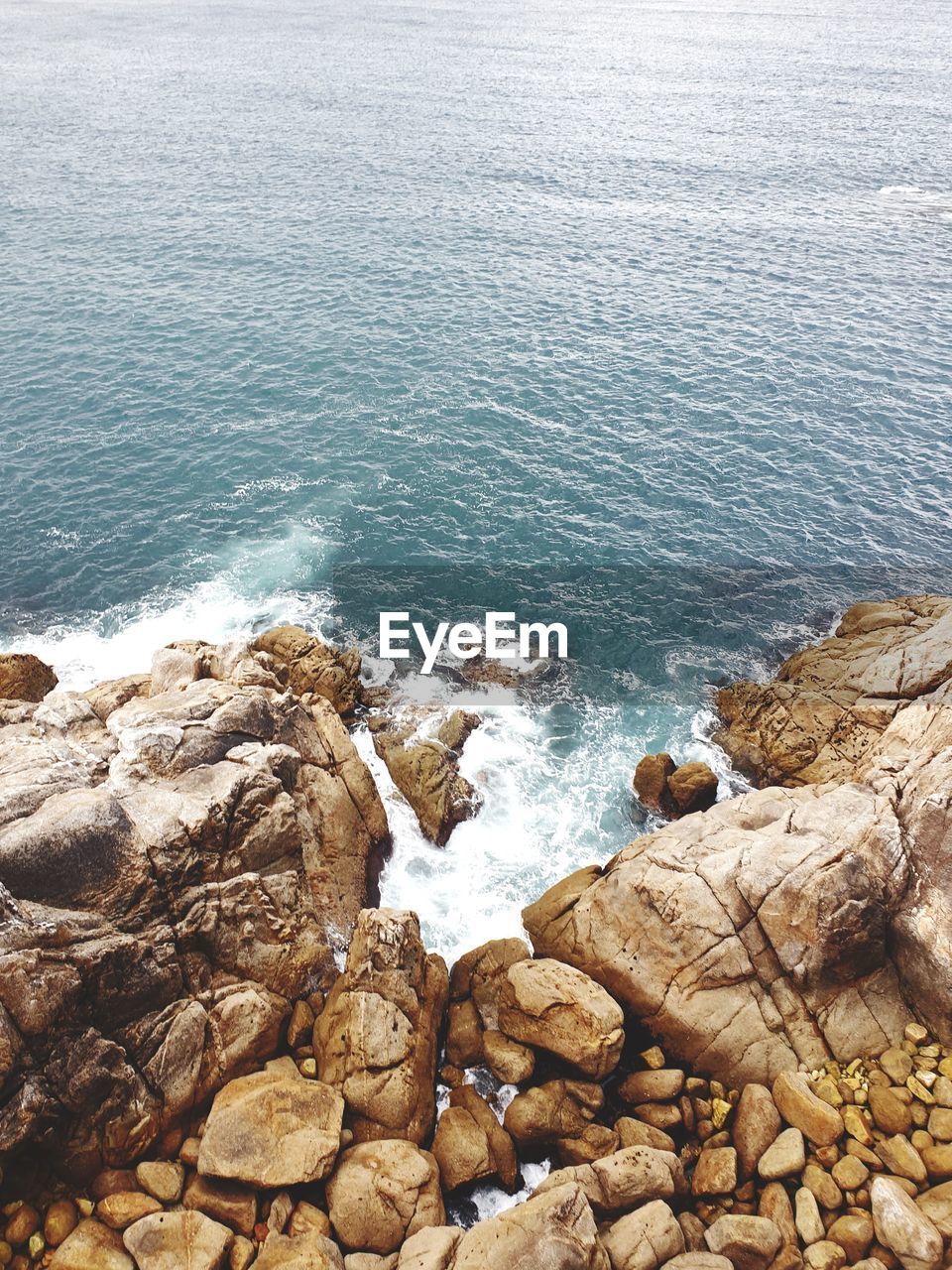 High angle view of rocks on beach. celtic coast. the waves and coast in la coruña are impressive.