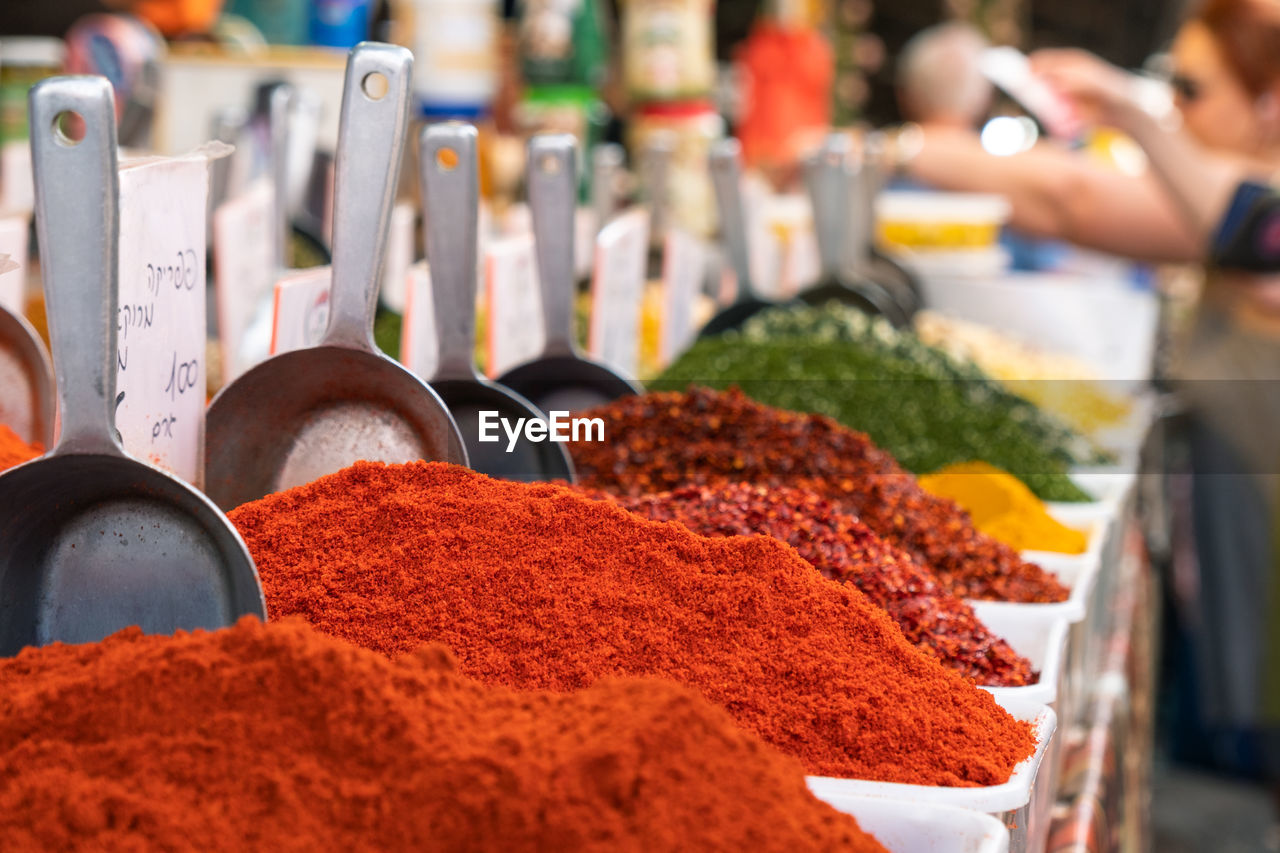 Variation of spices for sale at market stall