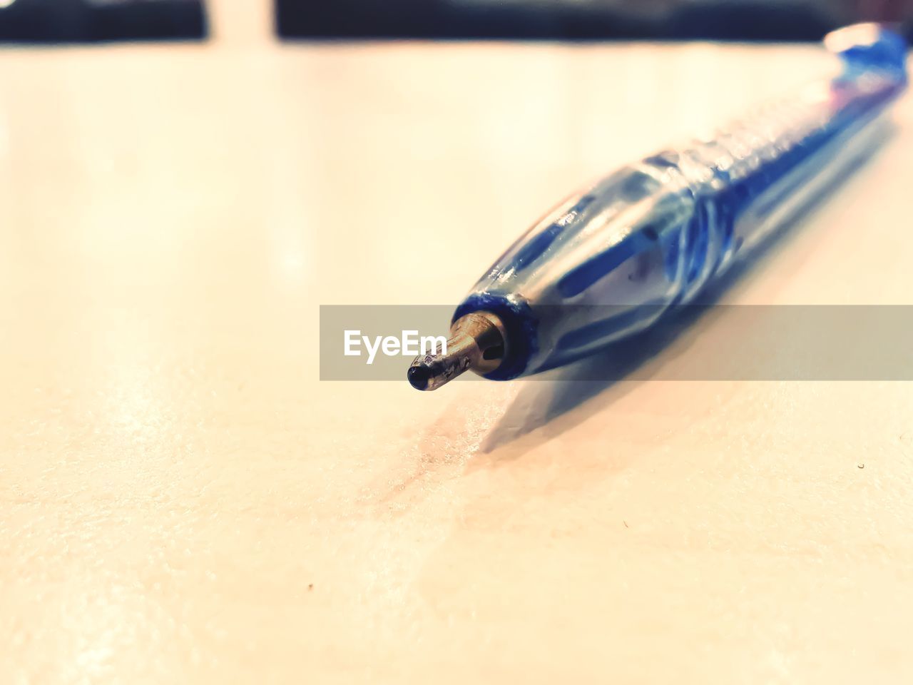 HIGH ANGLE VIEW OF PEN ON PAPER