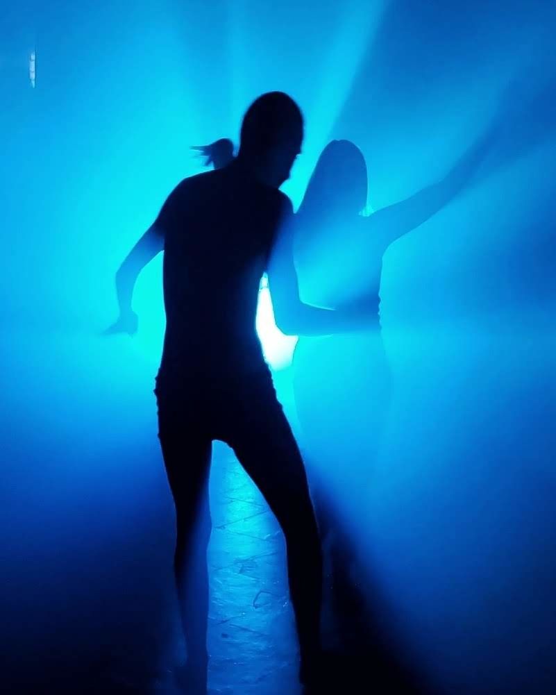 silhouette, blue, underwater, adult, indoors, one person, dancing, full length, arts culture and entertainment, standing, back lit, light, men, performance, nightlife, night, music, women