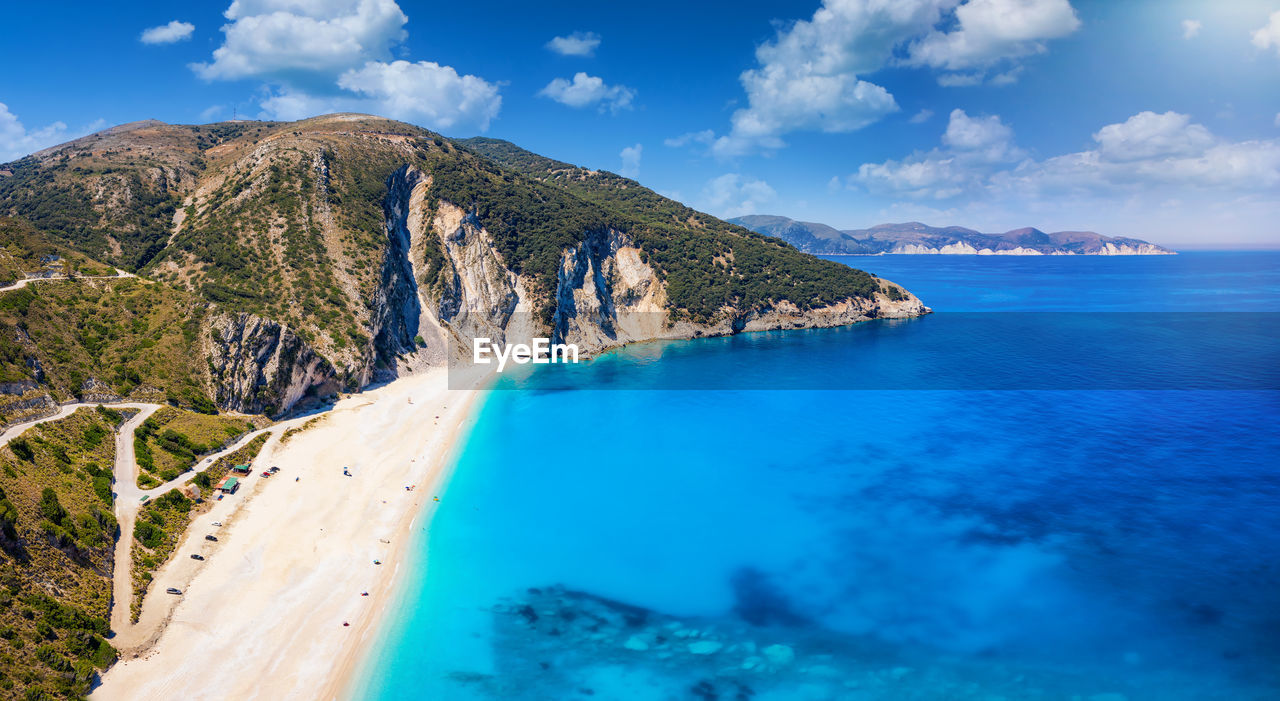 PANORAMIC VIEW OF SEA AND MOUNTAINS AGAINST SKY