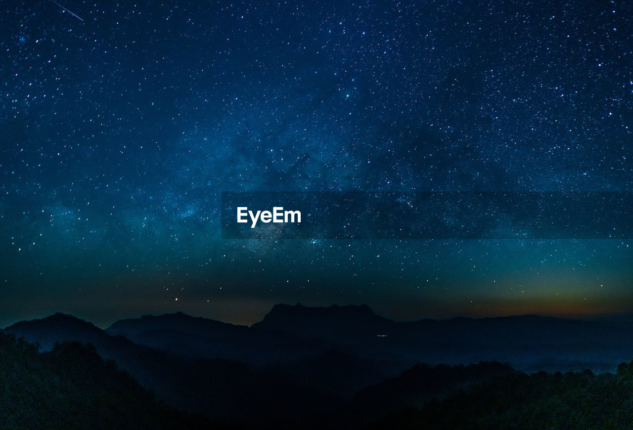 Night view with the milky way, the peak of doi luang, chiang dao, thailand