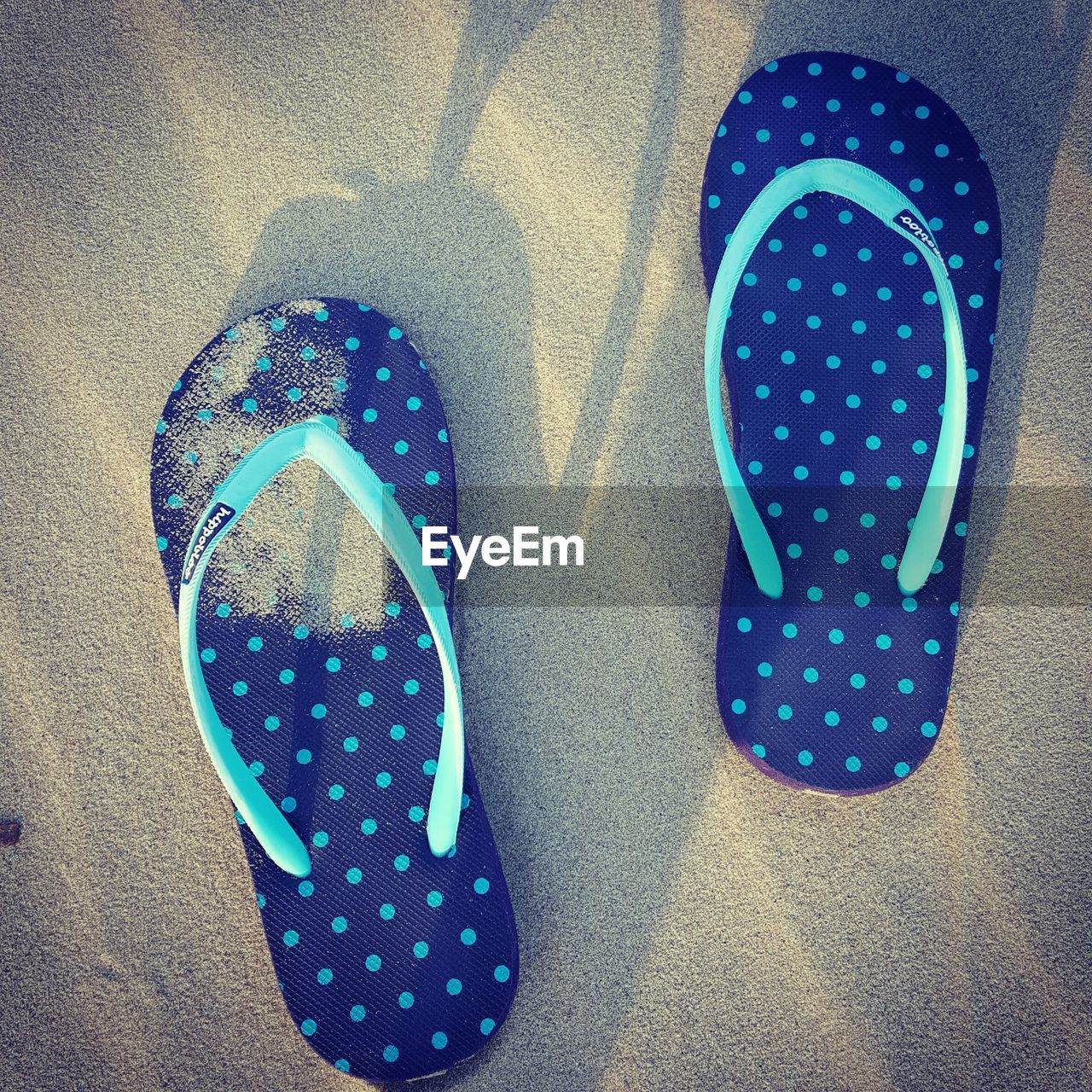 CLOSE-UP OF OBJECT ON WALL