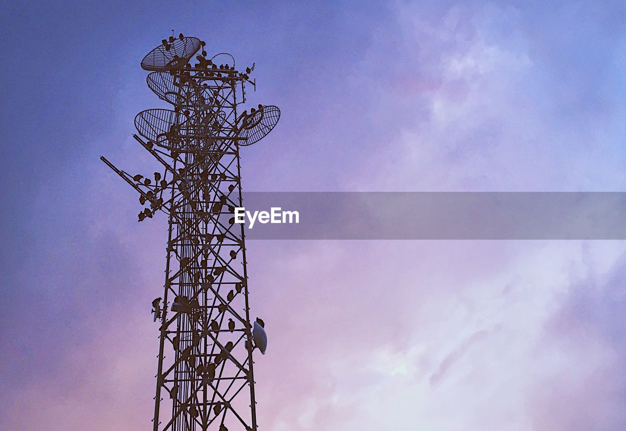 LOW ANGLE VIEW OF ELECTRICITY PYLON