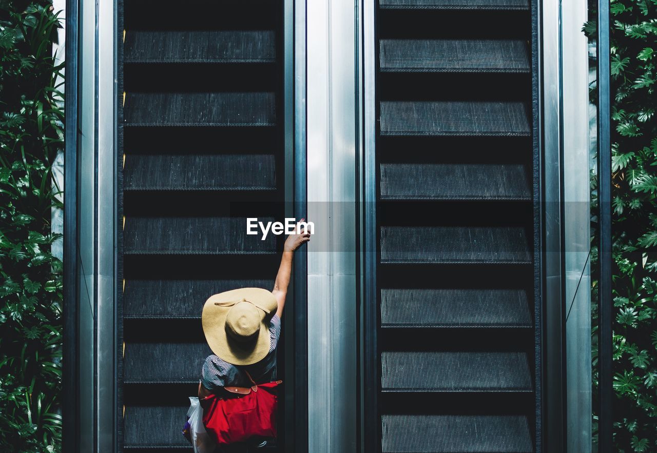 High angle view of person on escalator