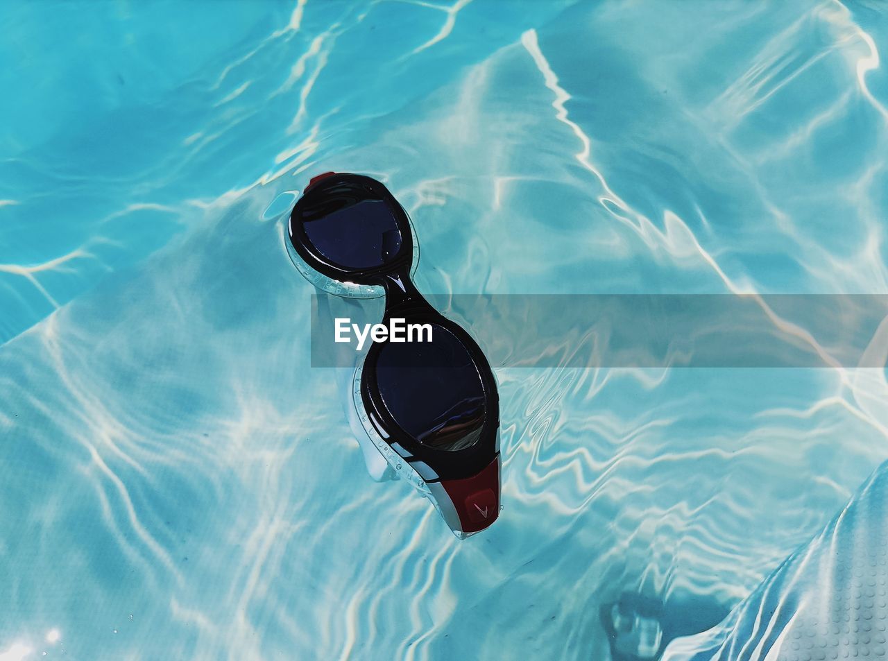 High angle view of swimming in pool