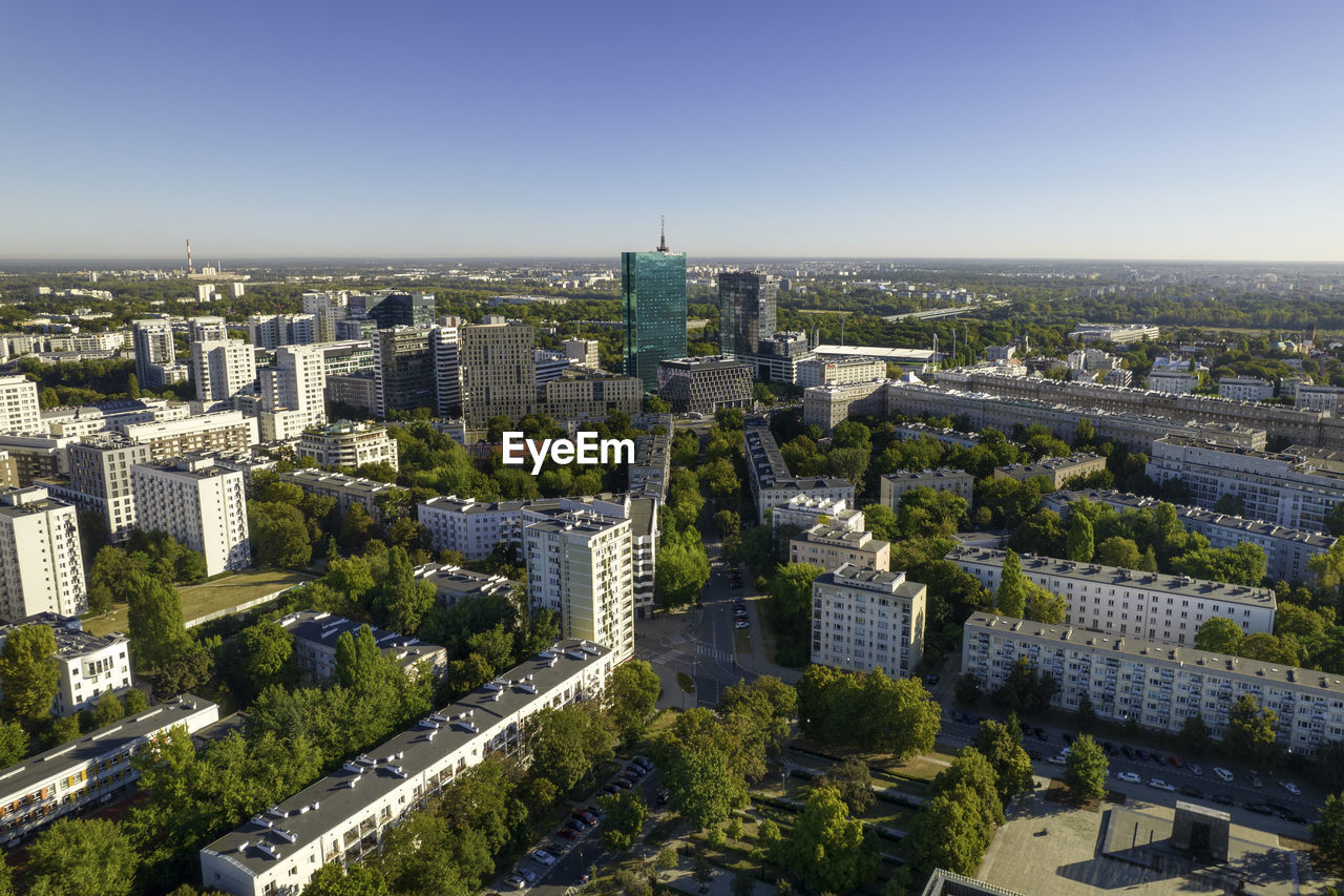 Beautiful panoramic drone view of the centre of modern warsaw with silhouettes of skyscrapers. 