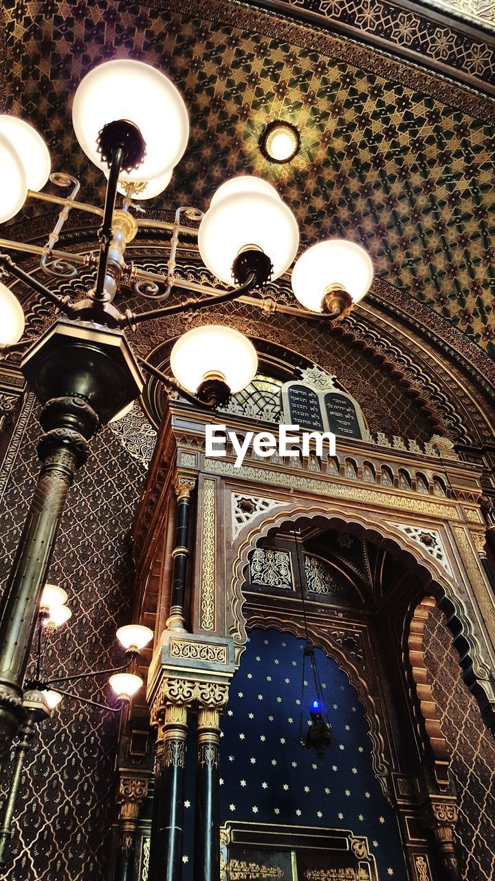 LOW ANGLE VIEW OF ILLUMINATED CEILING OF LIGHTS