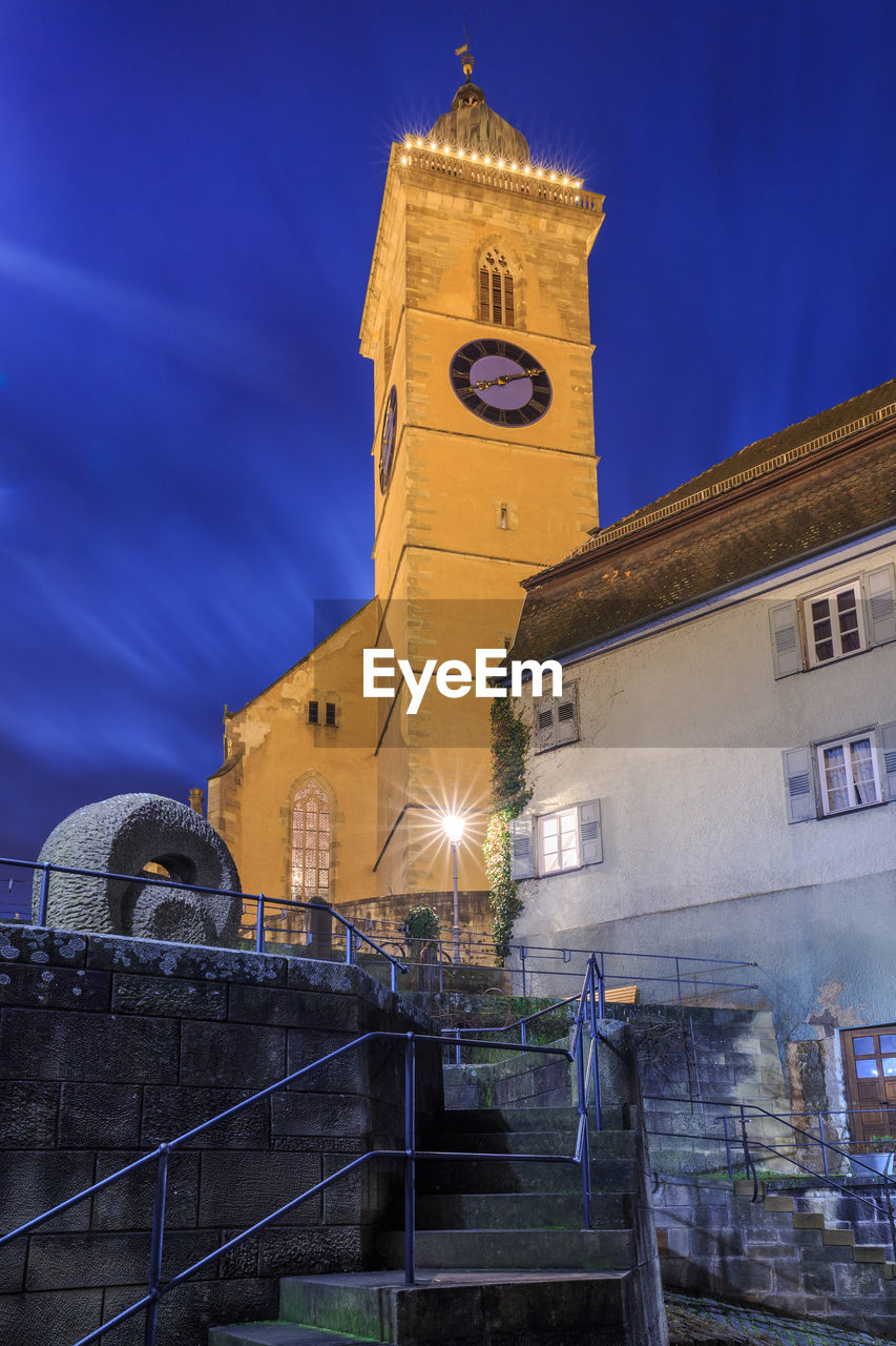 CLOCK TOWER AGAINST SKY AT NIGHT