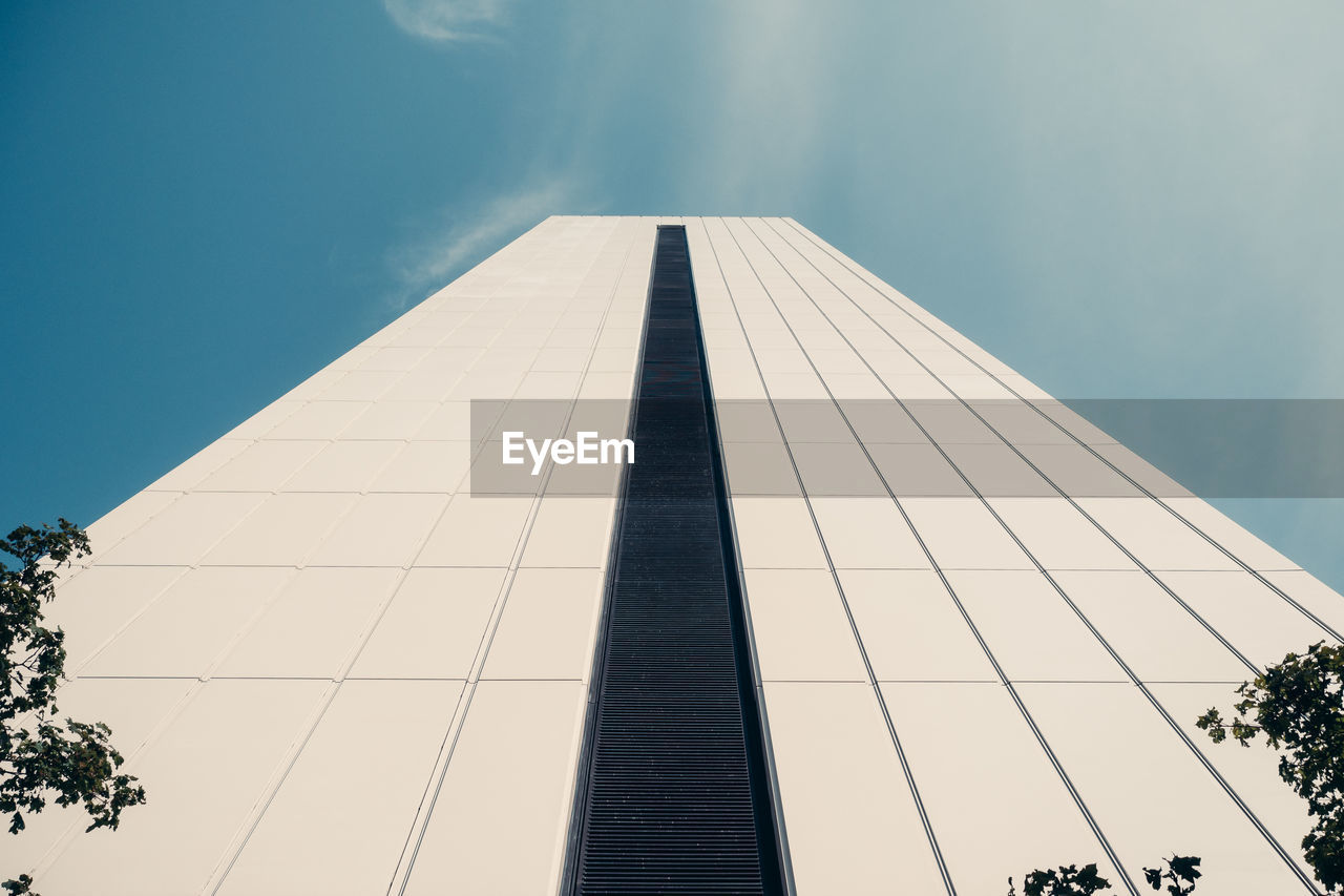 Low angle view of skyscraper against clear sky