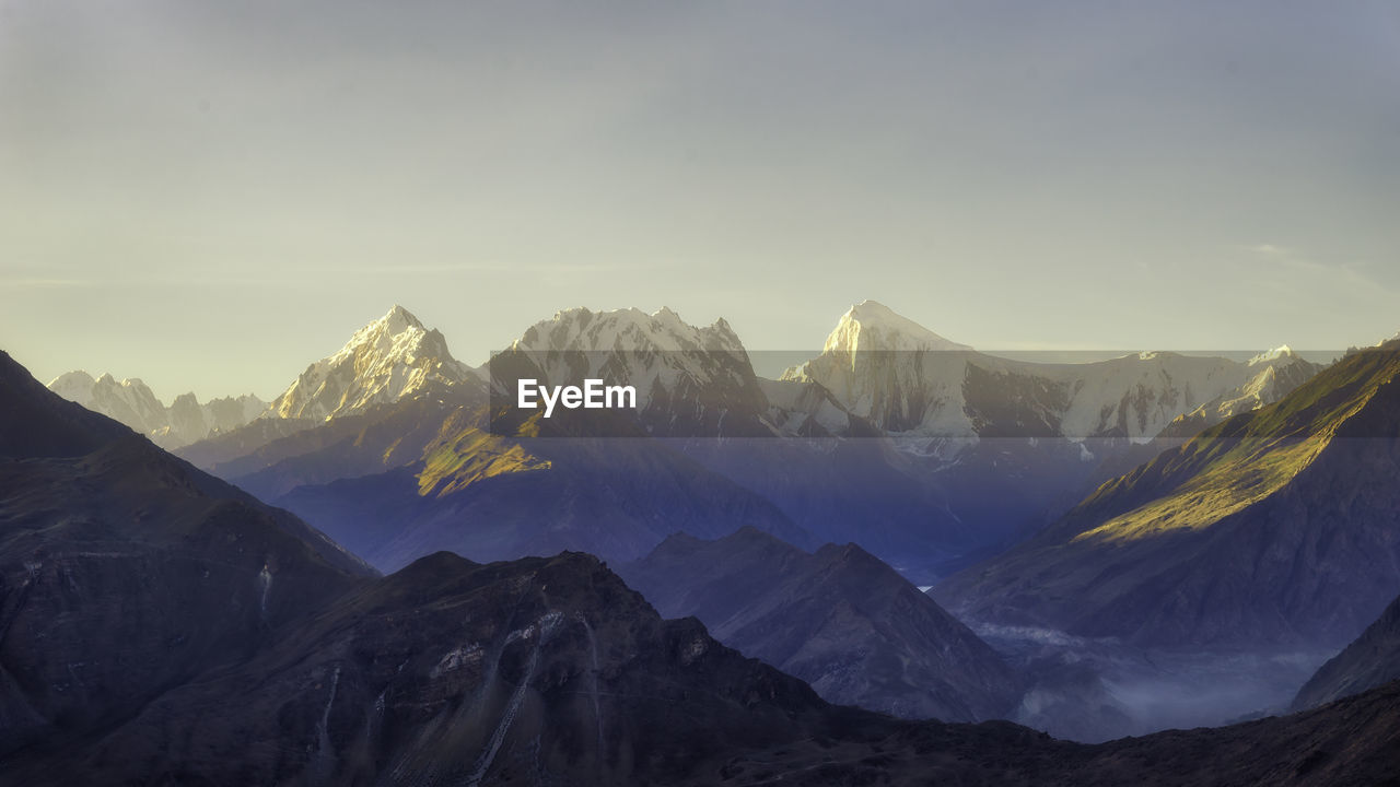 Scenic view of snowcapped mountain against sky