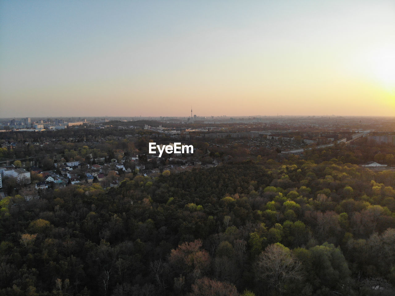 HIGH ANGLE VIEW OF BUILDINGS AGAINST CLEAR SKY