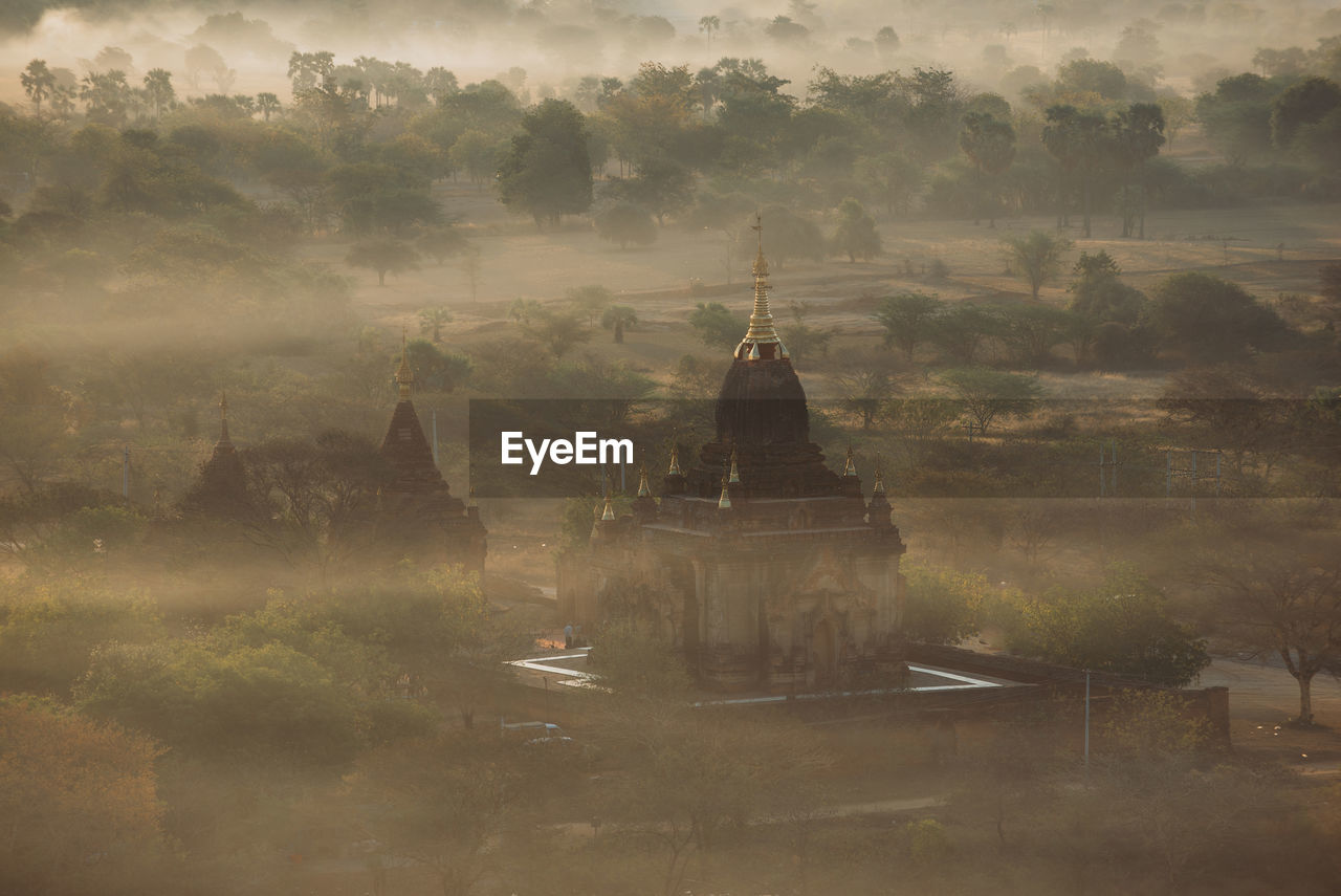 High angle view of temple during foggy weather