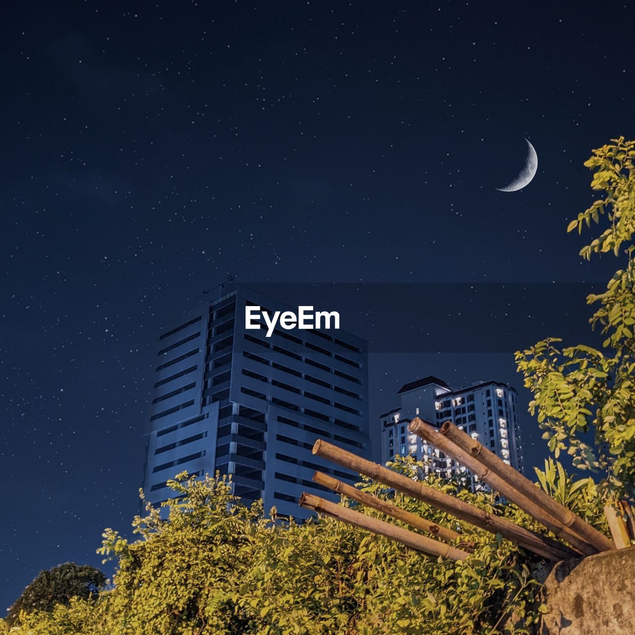 Low angle view of building against sky at night