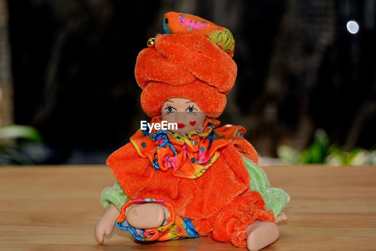 CLOSE-UP OF FIGURINE ON TABLE