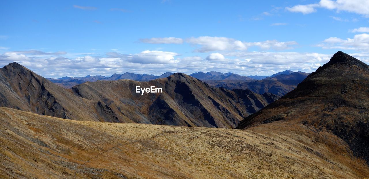 Panoramic view of mountains against sky