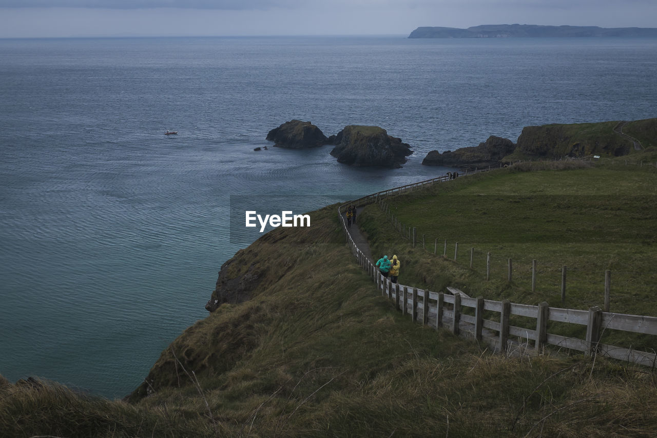 High angle view of mountain by sea