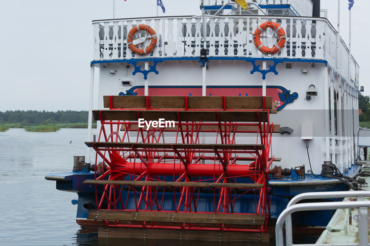 RED SHIP IN WATER