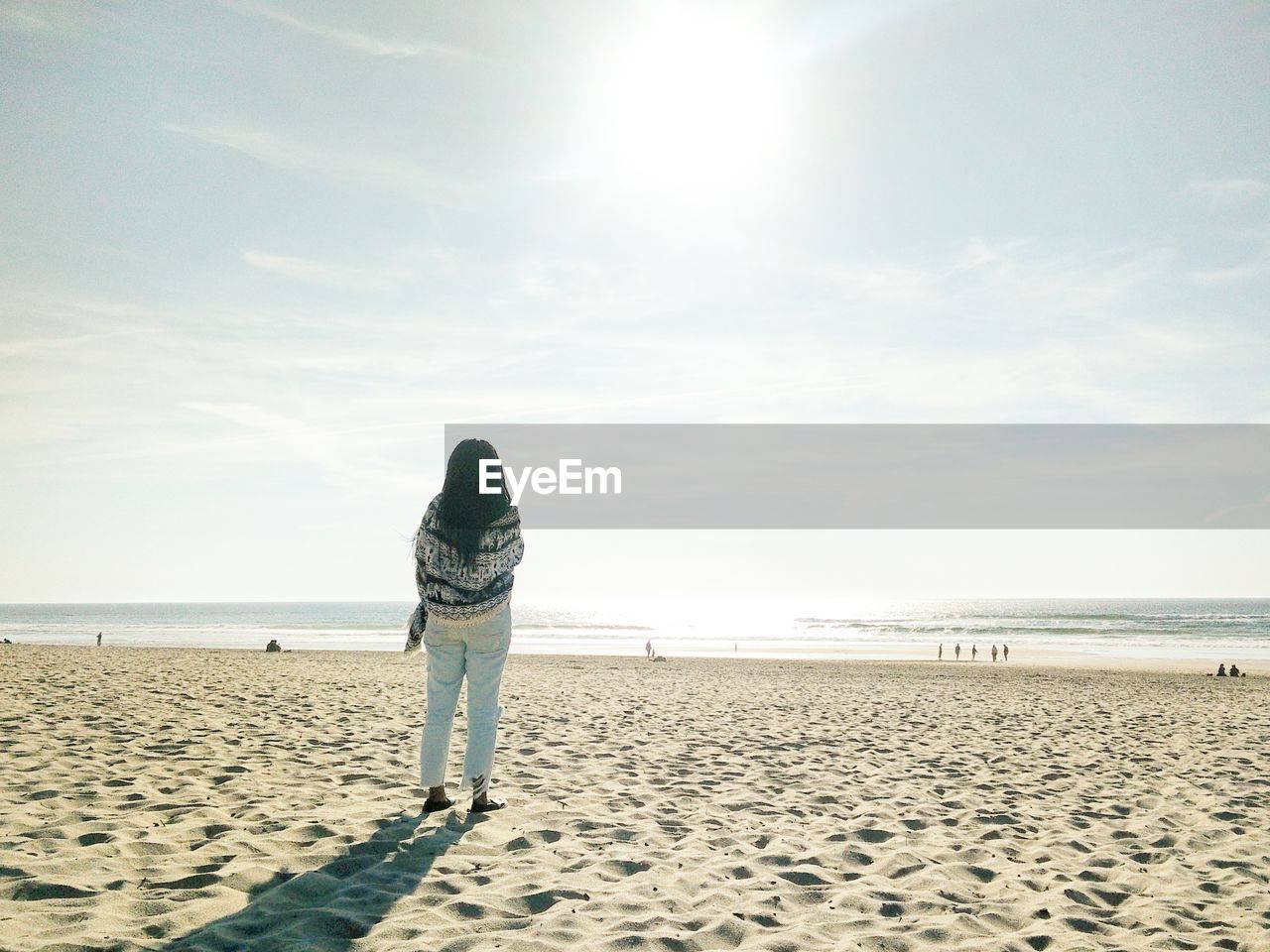 Rear view of woman on beach