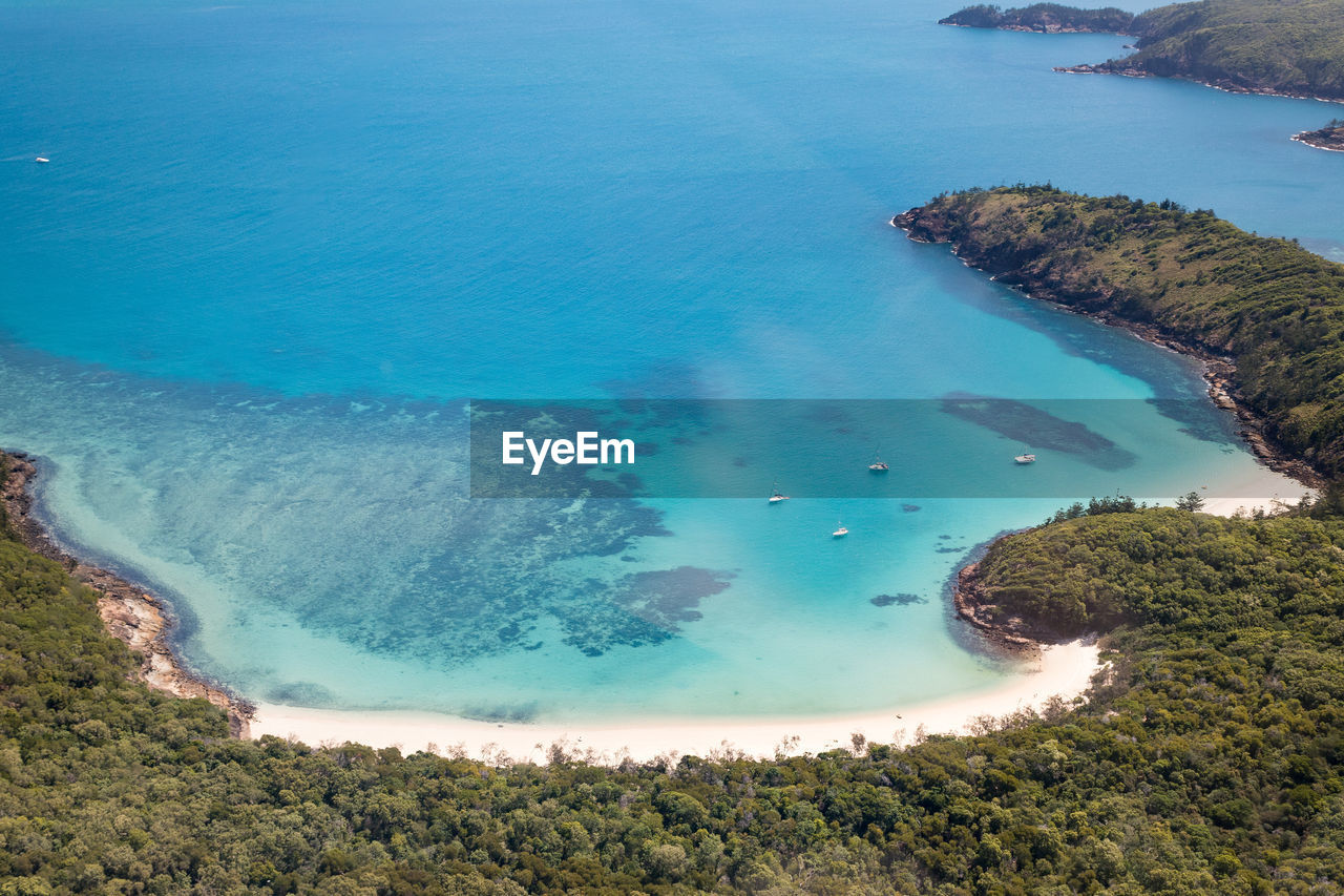 High angle view of beach against blue sky