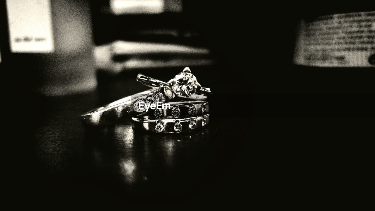 Close-up of rings on table