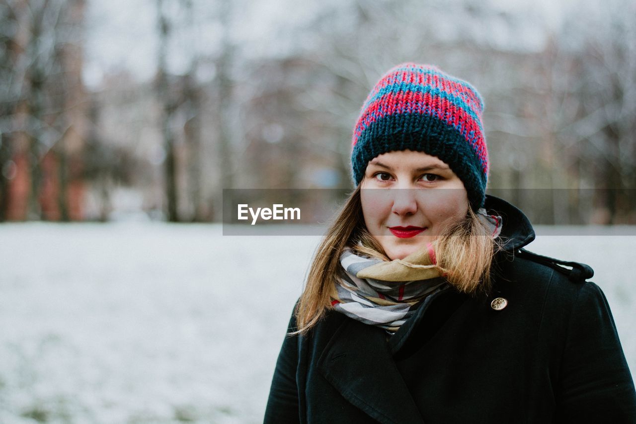 Close-up of young woman in winter