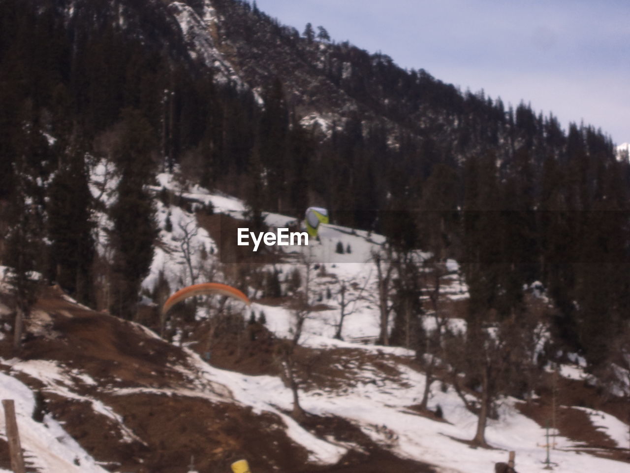 SKI LIFT OVER SNOW MOUNTAINS