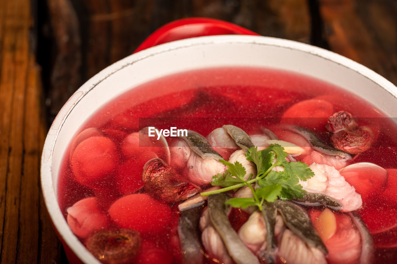food and drink, food, healthy eating, freshness, wellbeing, dish, produce, herb, vegetable, bowl, fruit, no people, red, indoors, household equipment, soup, close-up, wood, strawberry, cold temperature, leaf, refreshment, high angle view, meat, plant, drink