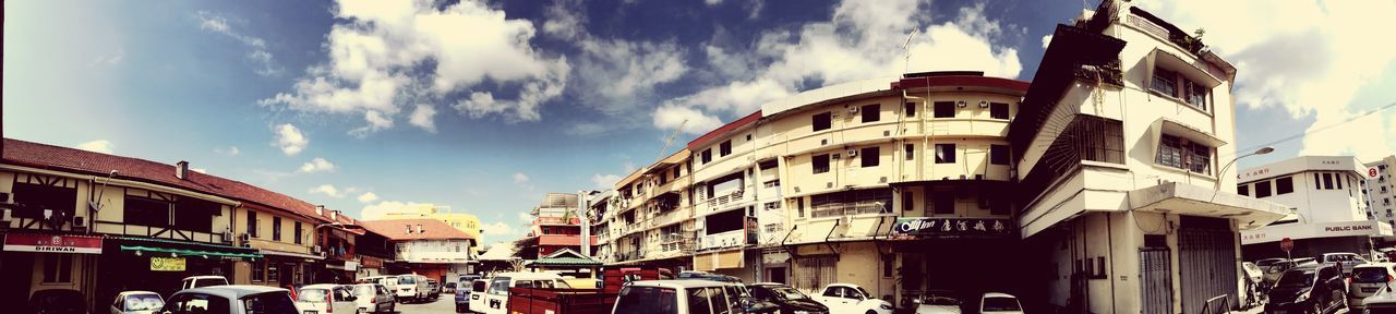 LOW ANGLE VIEW OF BUILDINGS AGAINST SKY