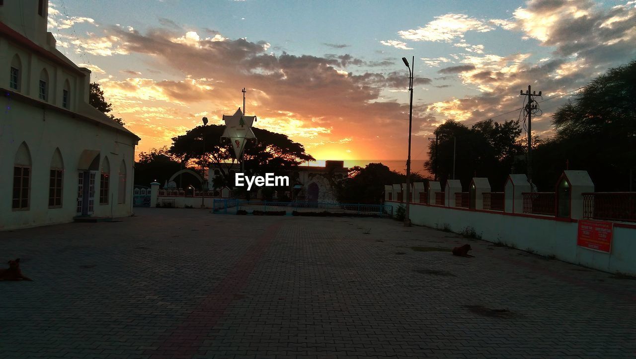 VIEW OF STREET LIGHTS AT SUNSET