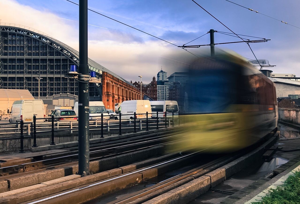 TRAIN AGAINST SKY DURING SUNSET