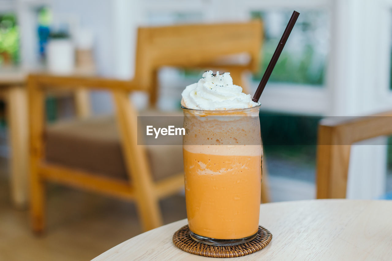 Close-up of cold drink on table