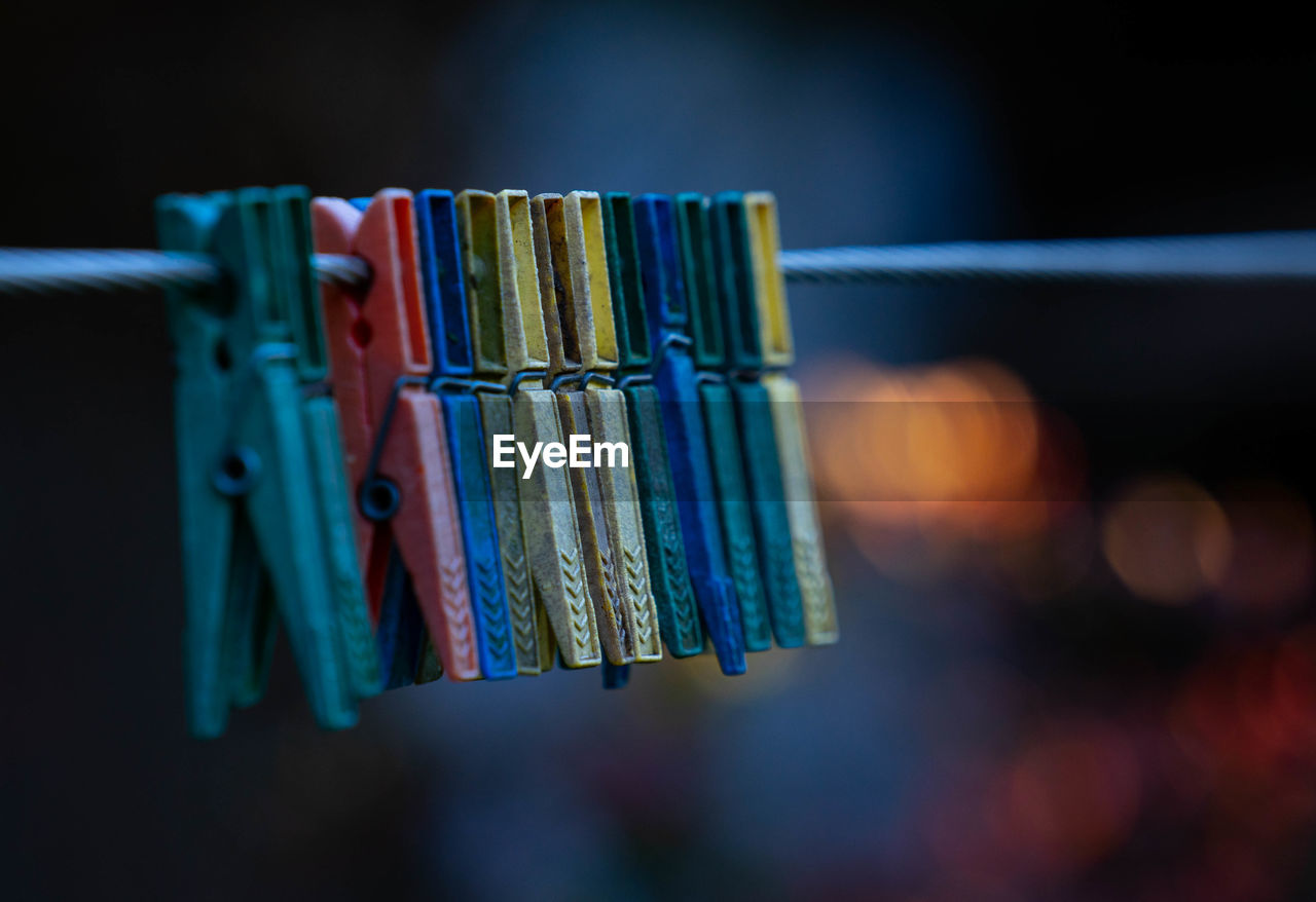 Close-up of clothes hanging on clothesline