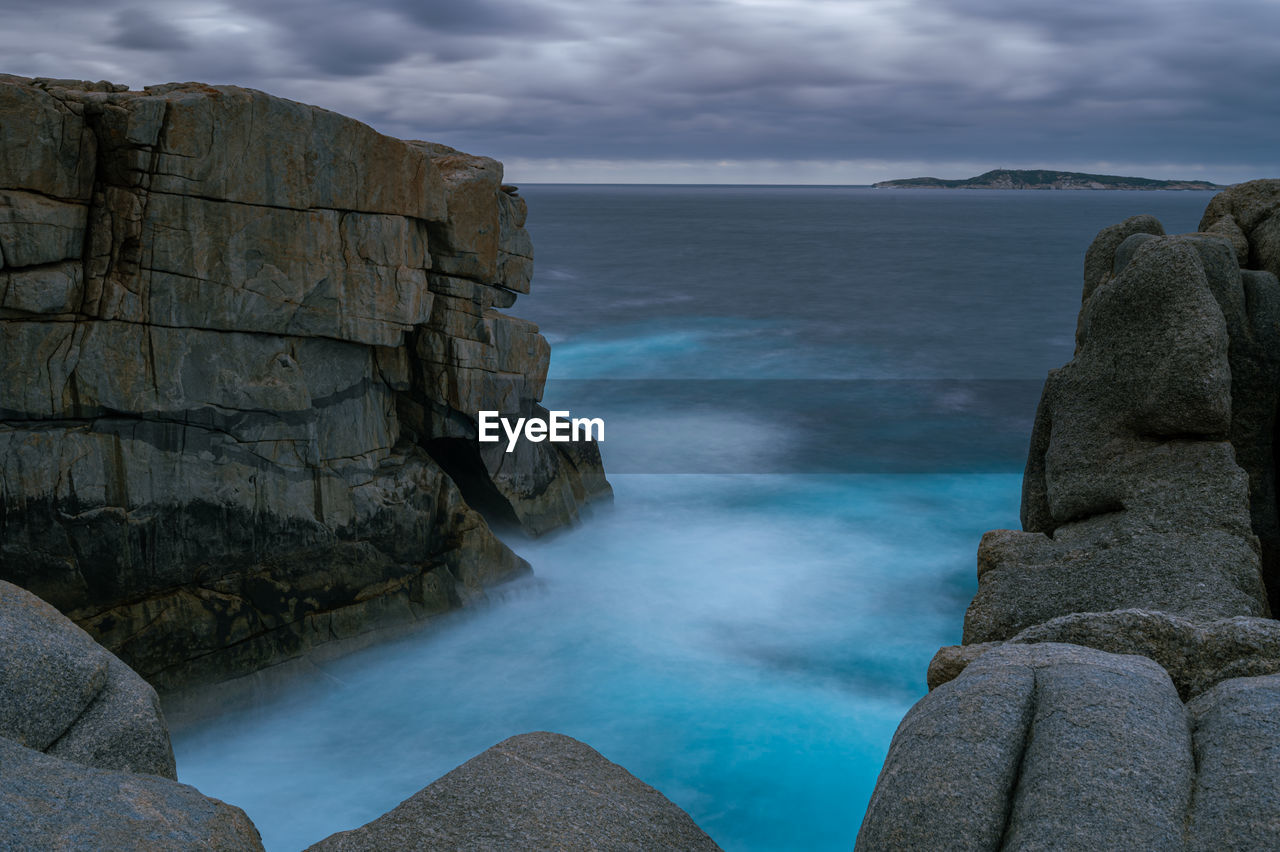 SCENIC VIEW OF SEA AND ROCKS