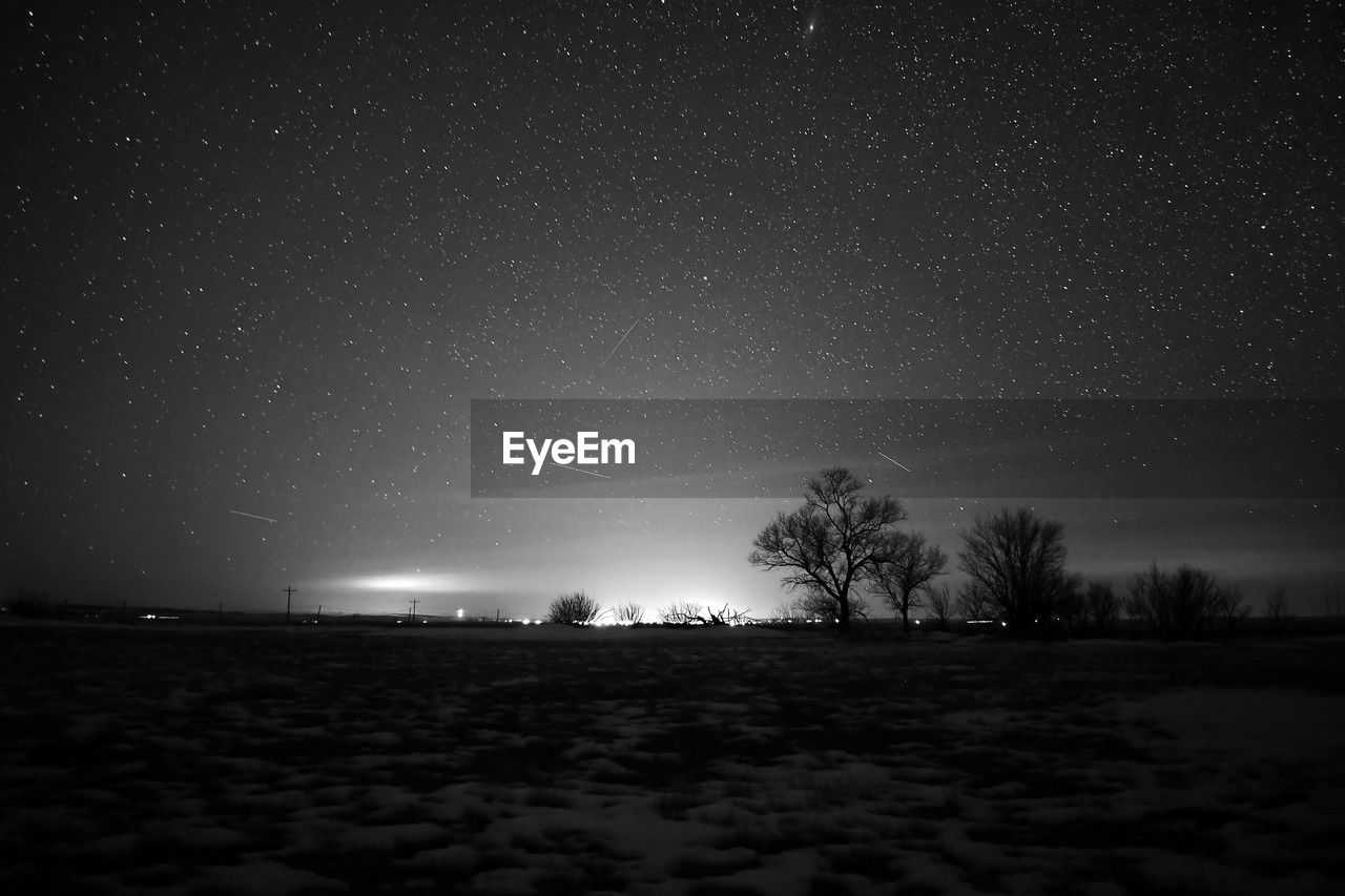 scenic view of landscape against sky at night