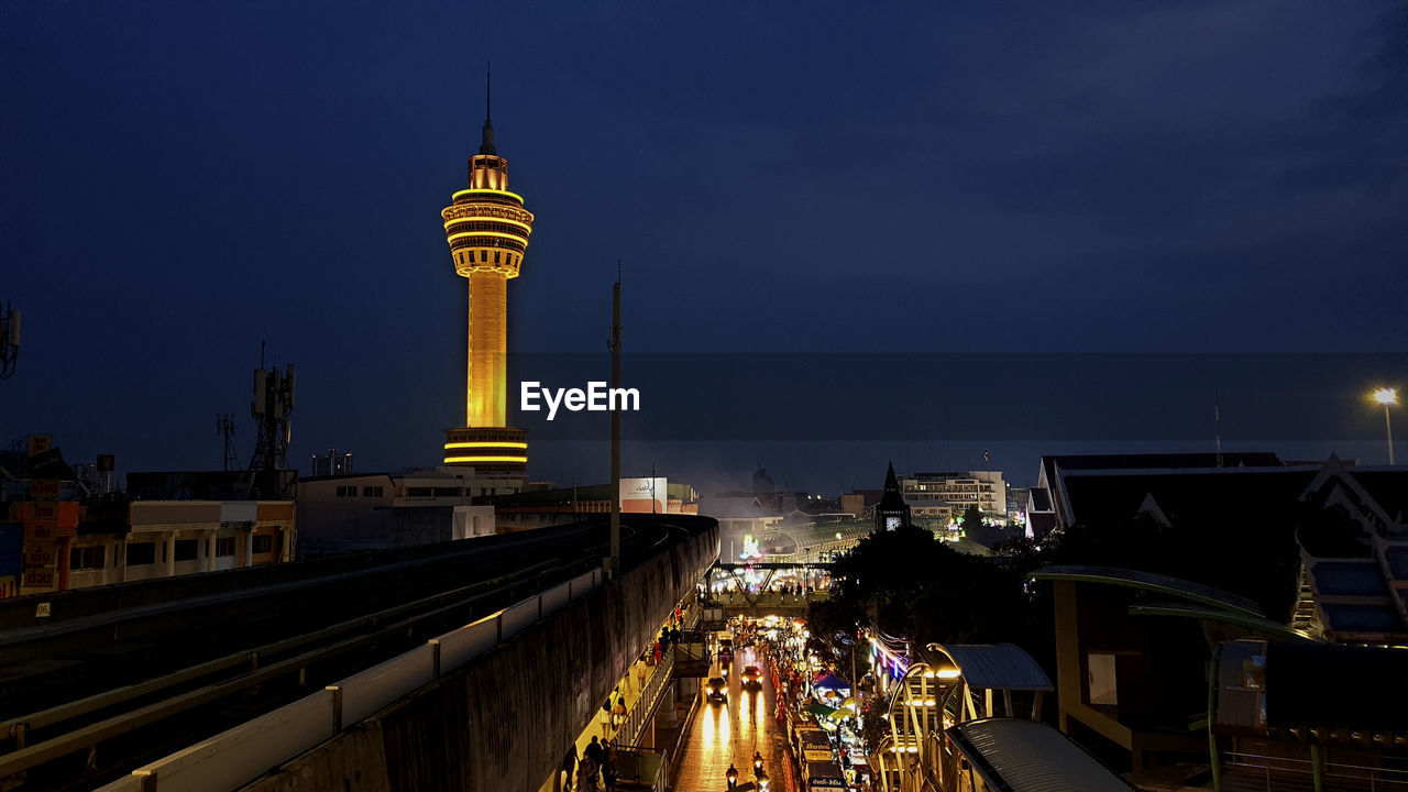 Illuminated buildings in city at night