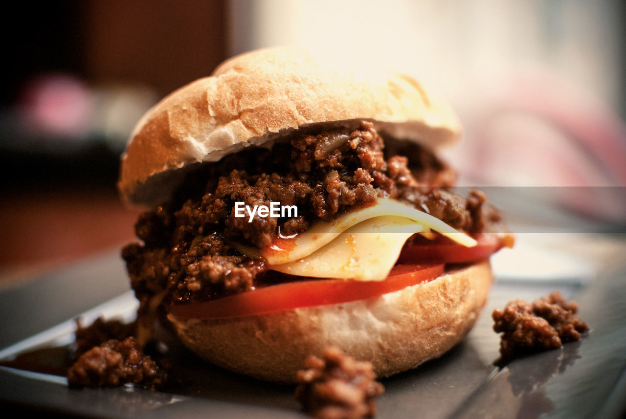 Close-up of burger in plate on table