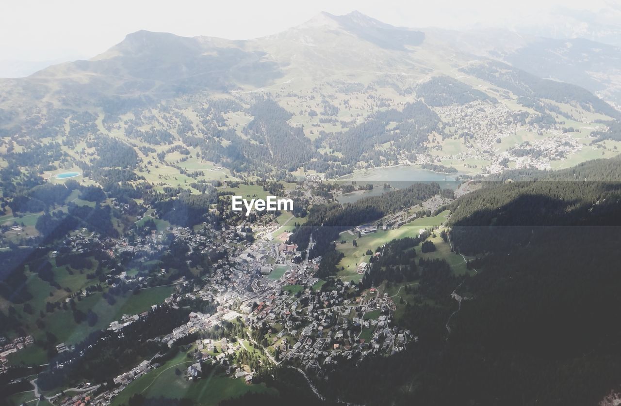 AERIAL VIEW OF LANDSCAPE AND MOUNTAINS