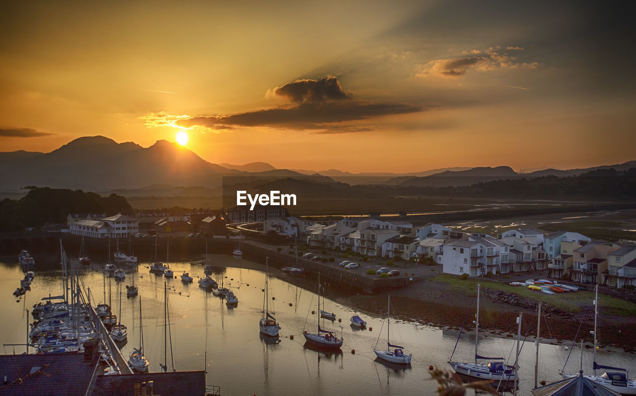 High angle view of city at sunset