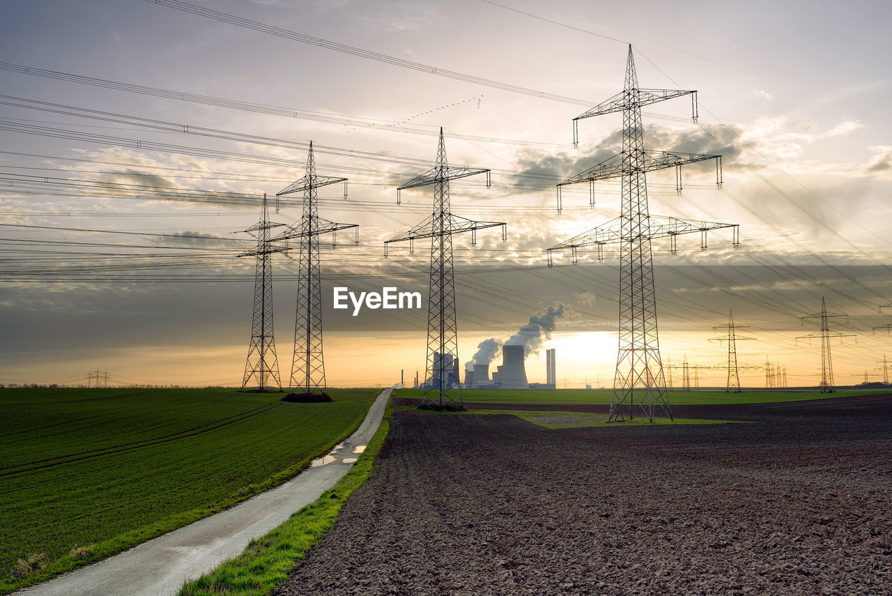 ELECTRICITY PYLON ON FIELD